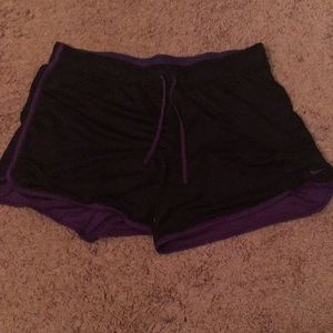 Purple and black Nike shorts